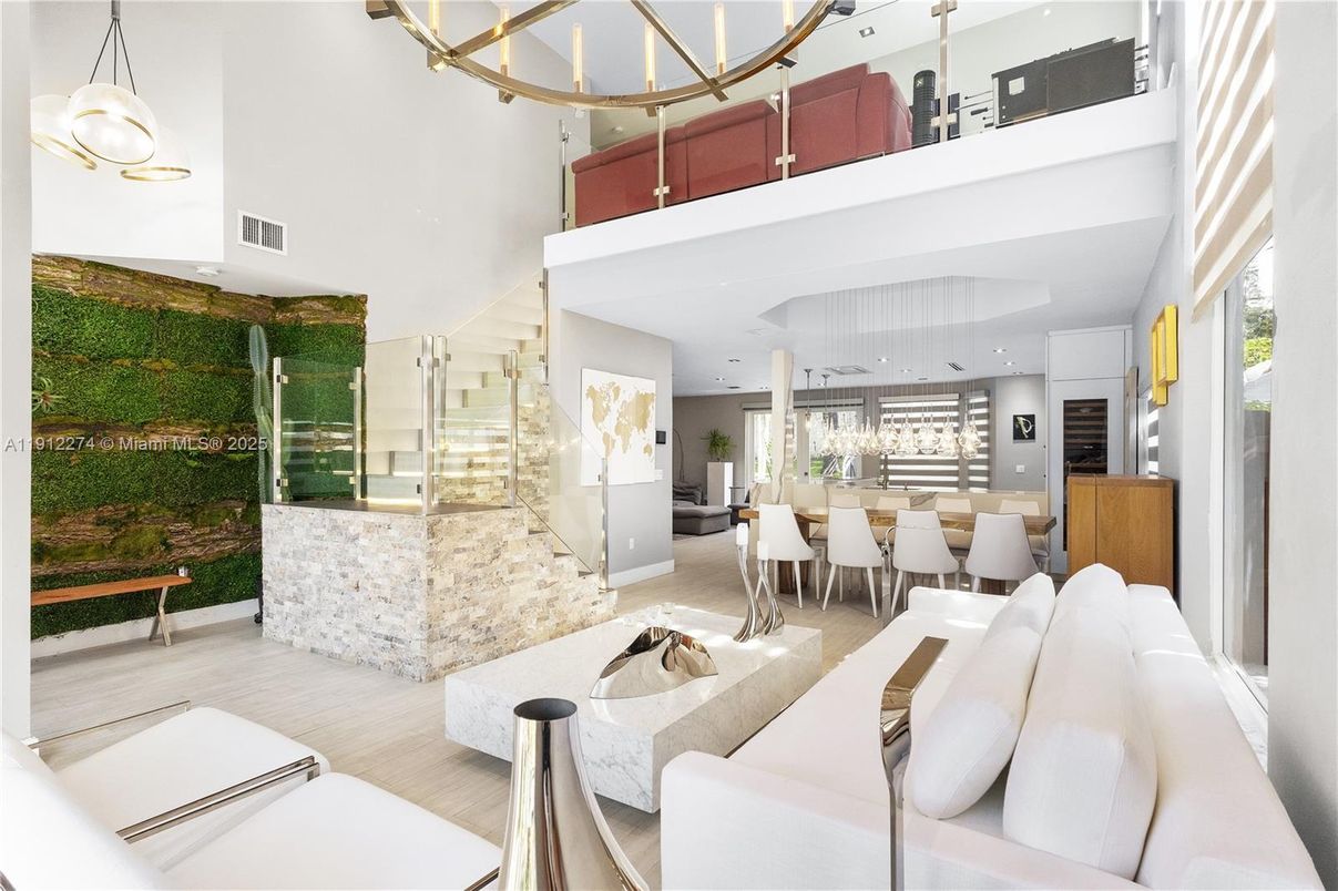 Chandelier, Dining room, Interior, Kitchen, Living room, Pendant Lights, Recessed Lighting, Stainless Steel Appliances, Wood Texture Flooring