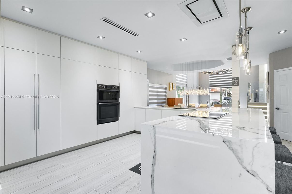 Chandelier, Interior, Kitchen, Pendant Lights, Recessed Lighting, Stainless Steel Appliances, Wood Texture Flooring