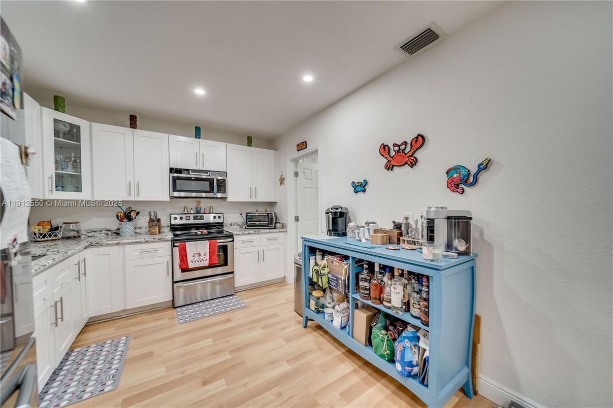 Interior, Kitchen, Recessed Lighting, Stainless Steel Appliances, Wood Texture Flooring