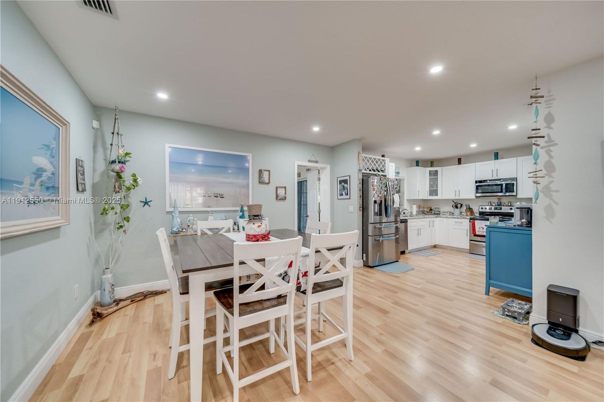 Dining room, Interior, Kitchen, Recessed Lighting, Stainless Steel Appliances, Wood Texture Flooring