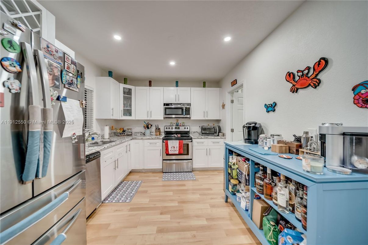 Interior, Kitchen, Recessed Lighting, Stainless Steel Appliances, Wood Texture Flooring