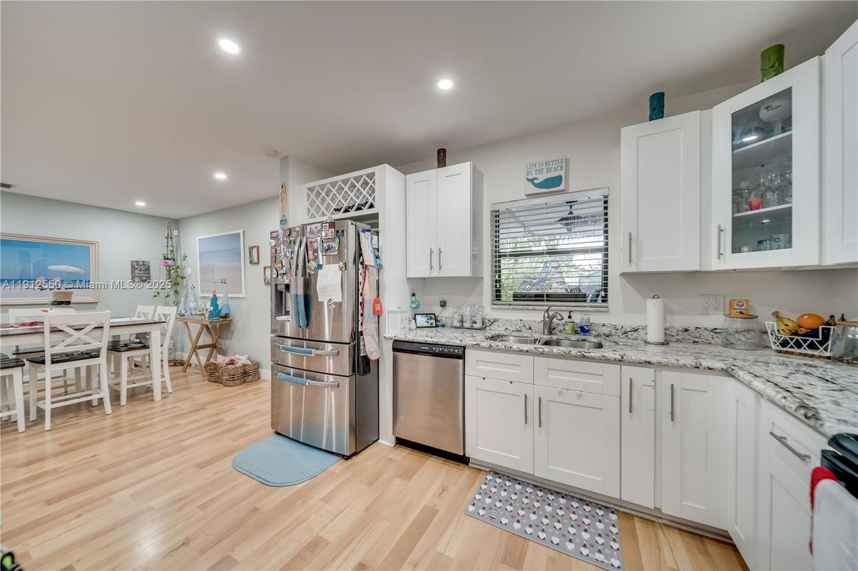 Dining room, Interior, Kitchen, Recessed Lighting, Stainless Steel Appliances, Wood Texture Flooring