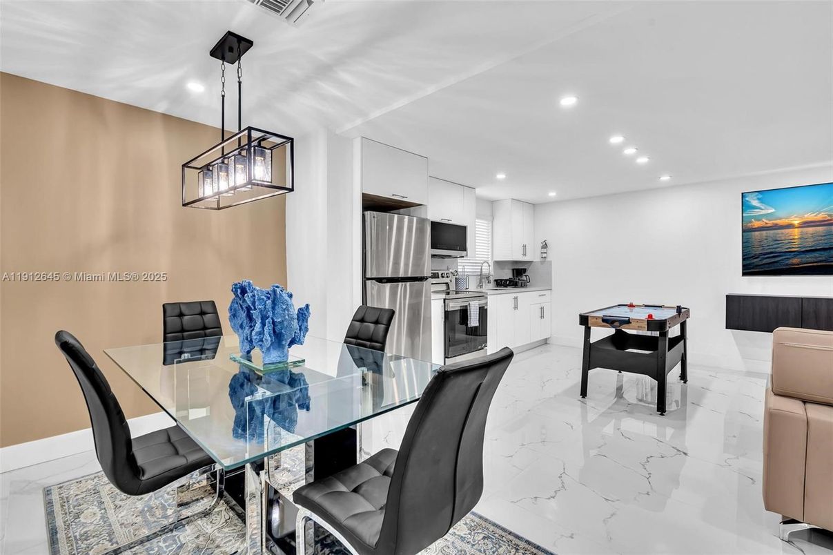 Dining room, Interior, Kitchen, Marble, Pendant Lights, Recessed Lighting, Stainless Steel Appliances