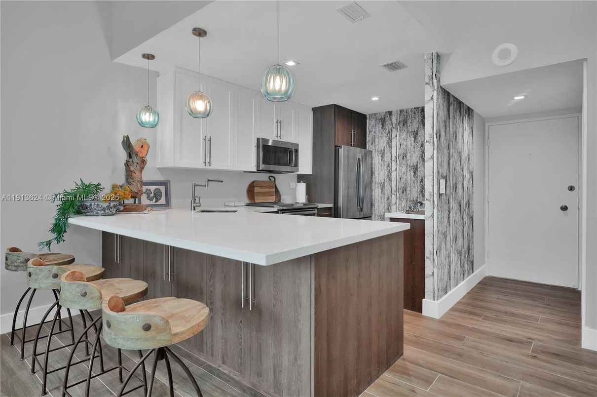 Interior, Kitchen, Pendant Lights, Recessed Lighting, Stainless Steel Appliances, Wood Texture Flooring