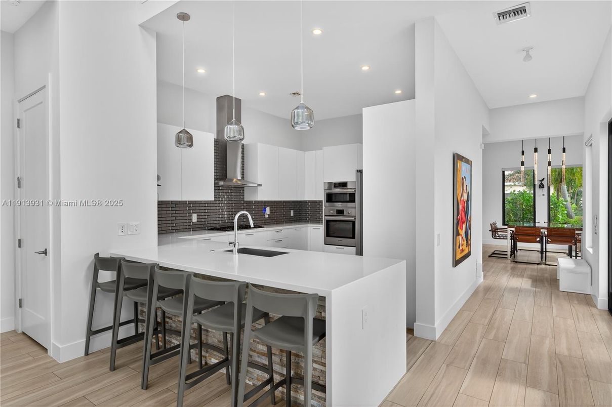 Interior, Kitchen, Pendant Lights, Recessed Lighting, Stainless Steel Appliances, Wood Texture Flooring