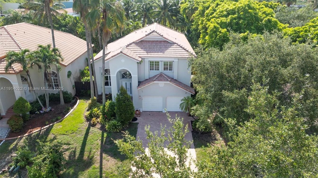 Attached, Exterior, Facade, Spanish Mediterranean