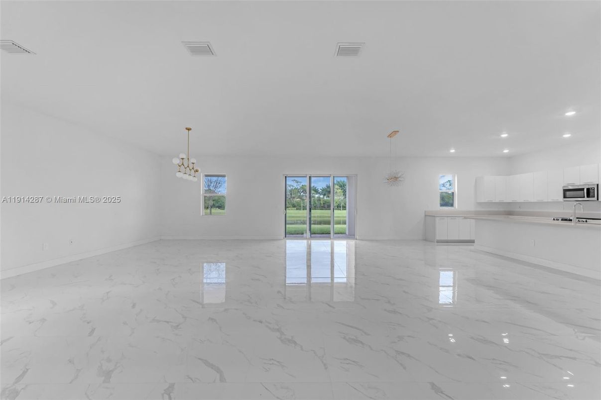 Chandelier, Empty room, Interior, Kitchen, Marble, Pendant Lights, Recessed Lighting, Stainless Steel Appliances
