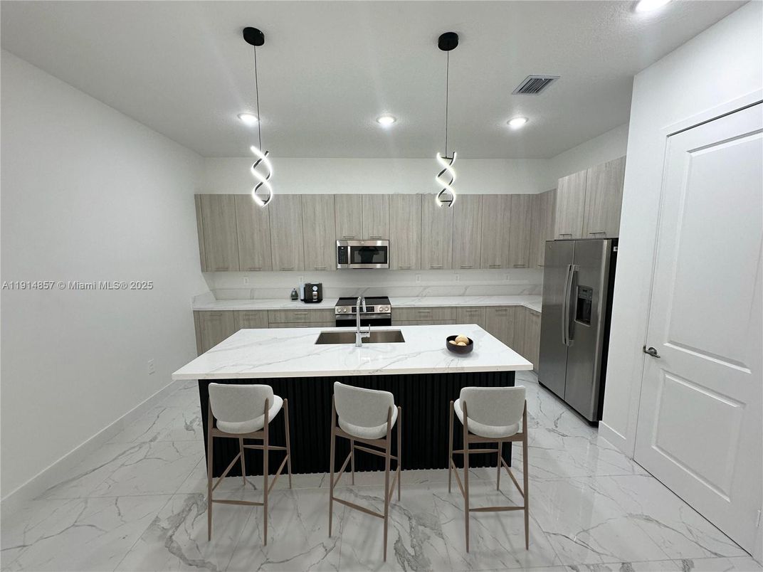 Interior, Kitchen, Marble, Pendant Lights, Recessed Lighting, Stainless Steel Appliances