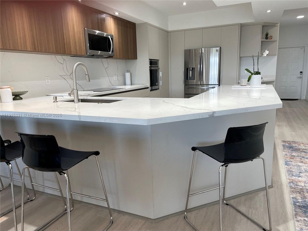 Interior, Kitchen, Recessed Lighting, Stainless Steel Appliances, Wood Texture Flooring