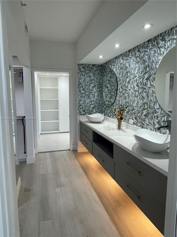 Bathroom, Dual Sink Vanities, Interior, Recessed Lighting, Wood Texture Flooring