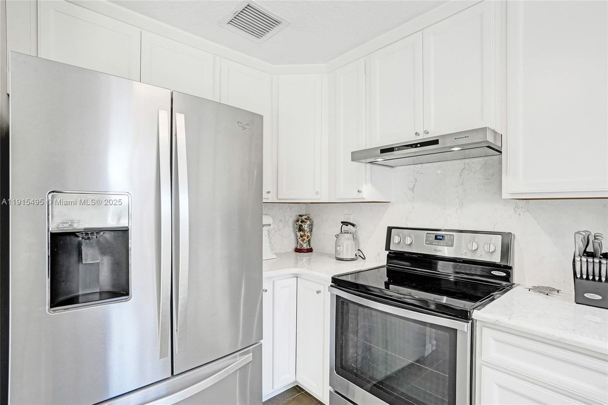 Interior, Kitchen, Marble Walls, Stainless Steel Appliances