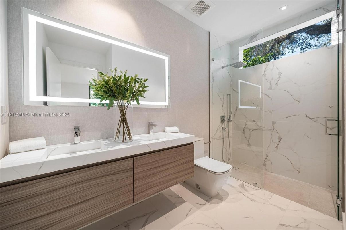 Bathroom, Dual Sink Vanities, Glass Shower, Interior, Marble, Marble Walls, Recessed Lighting