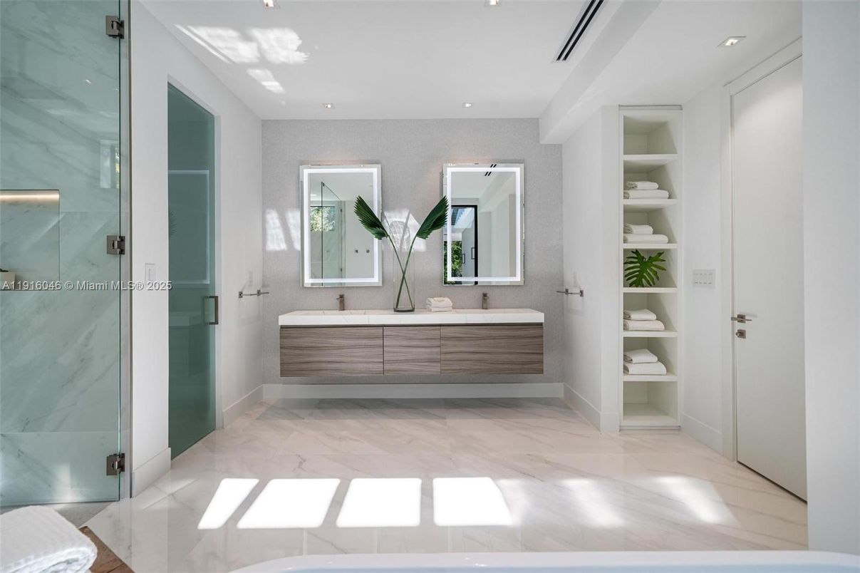 Bathroom, Dual Sink Vanities, Glass Shower, Interior, Marble, Marble Walls, Recessed Lighting