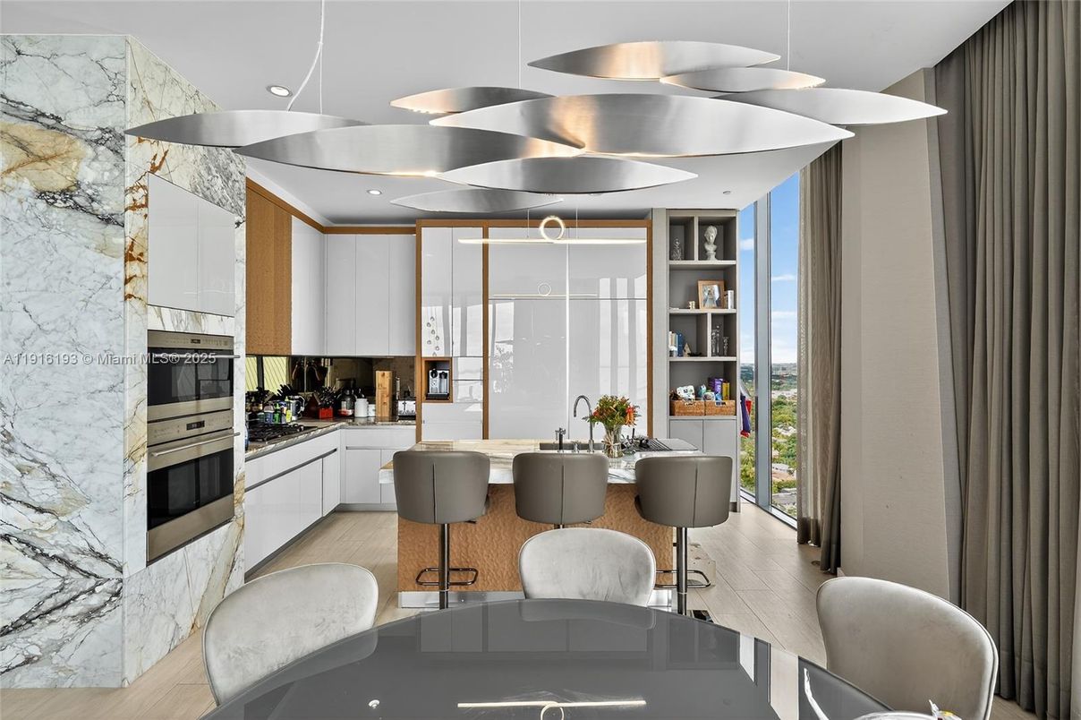 Interior, Kitchen, Marble Walls, Recessed Lighting, Stainless Steel Appliances