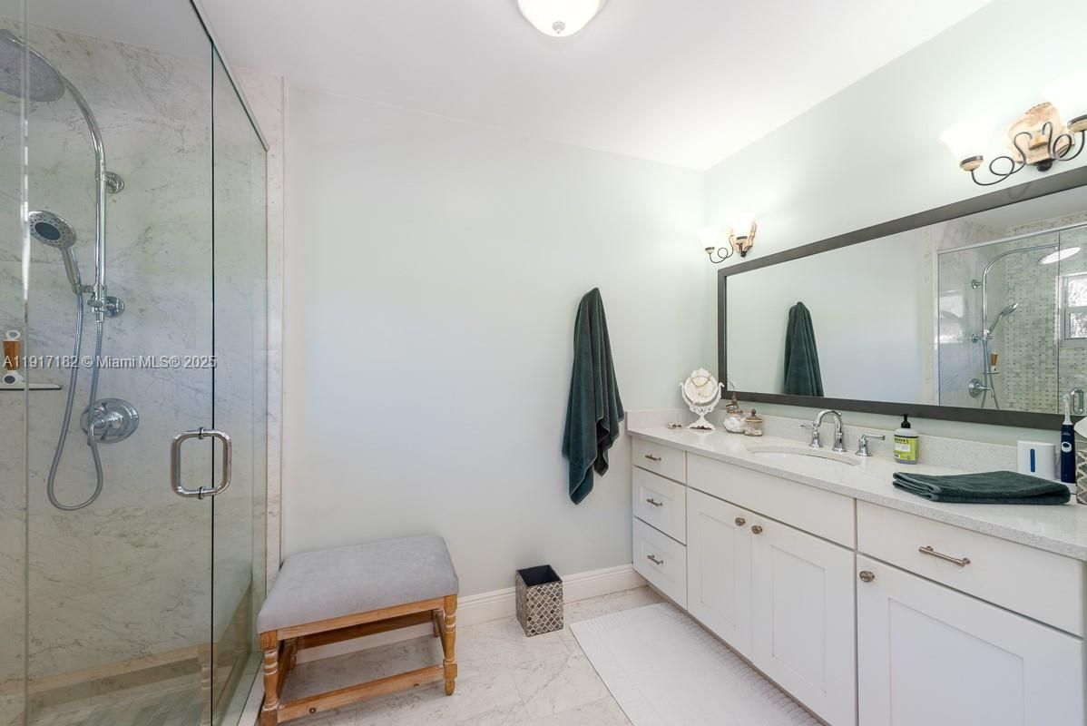 Bathroom, Dual Sink Vanities, Glass Shower, Interior, Marble, Marble Walls