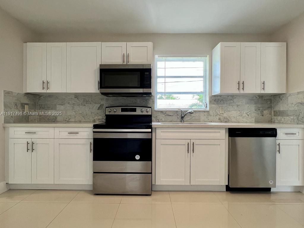 Interior, Kitchen, Marble Walls, Stainless Steel Appliances