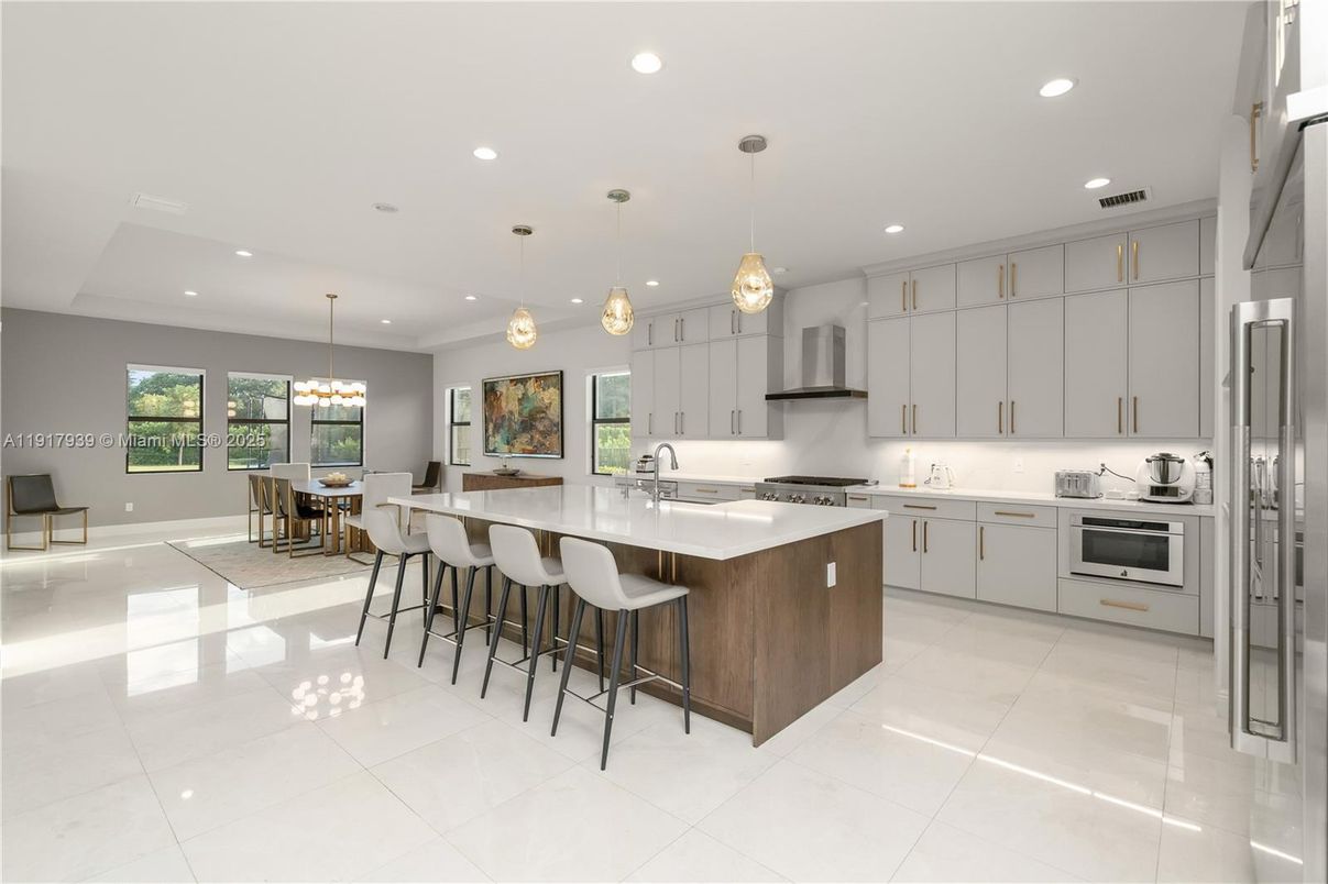 Chandelier, Dining room, Interior, Kitchen, Pendant Lights, Recessed Lighting, Stainless Steel Appliances