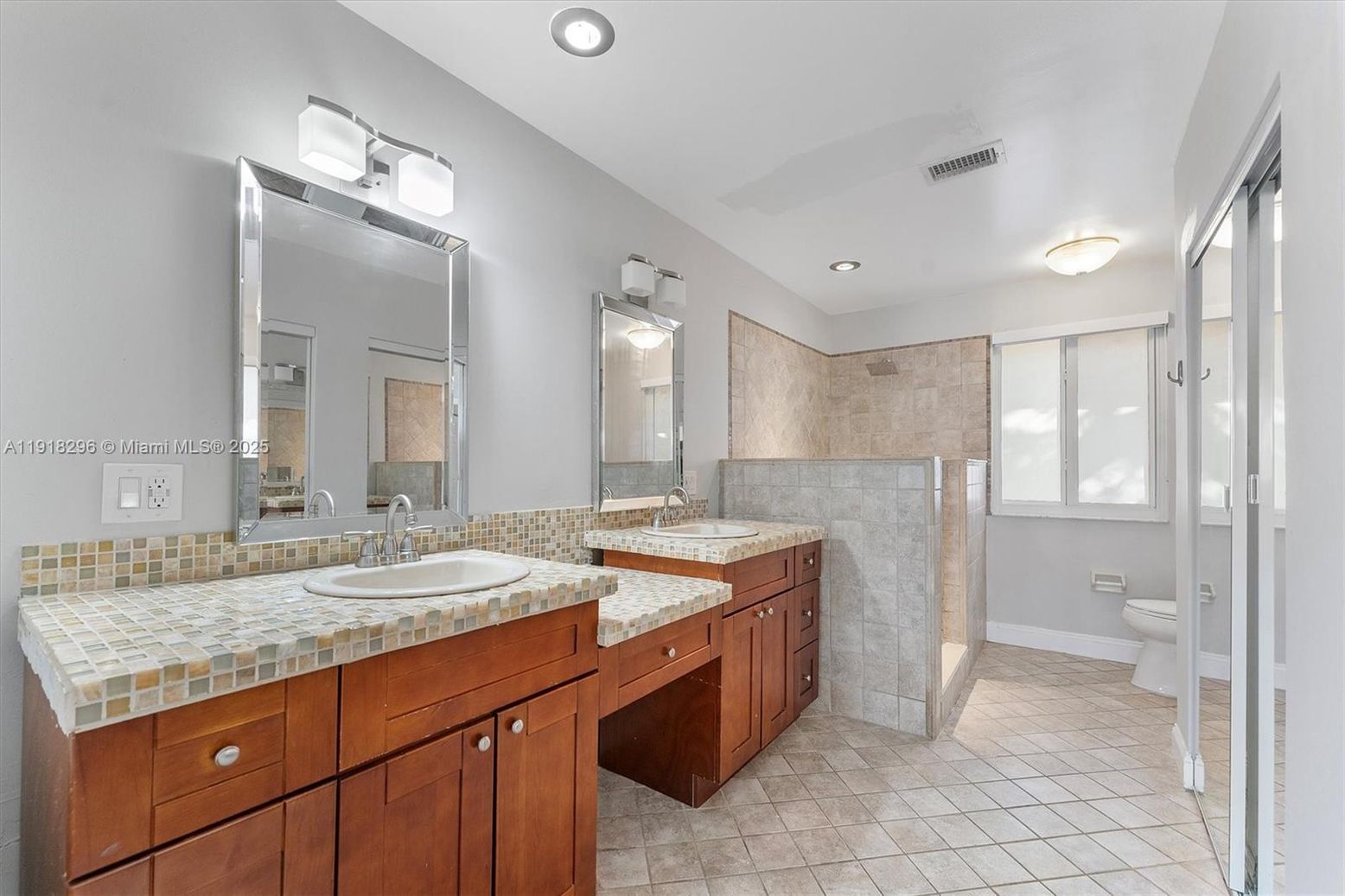 Bathroom, Dual Sink Vanities, Interior, Recessed Lighting, Tile Countertops