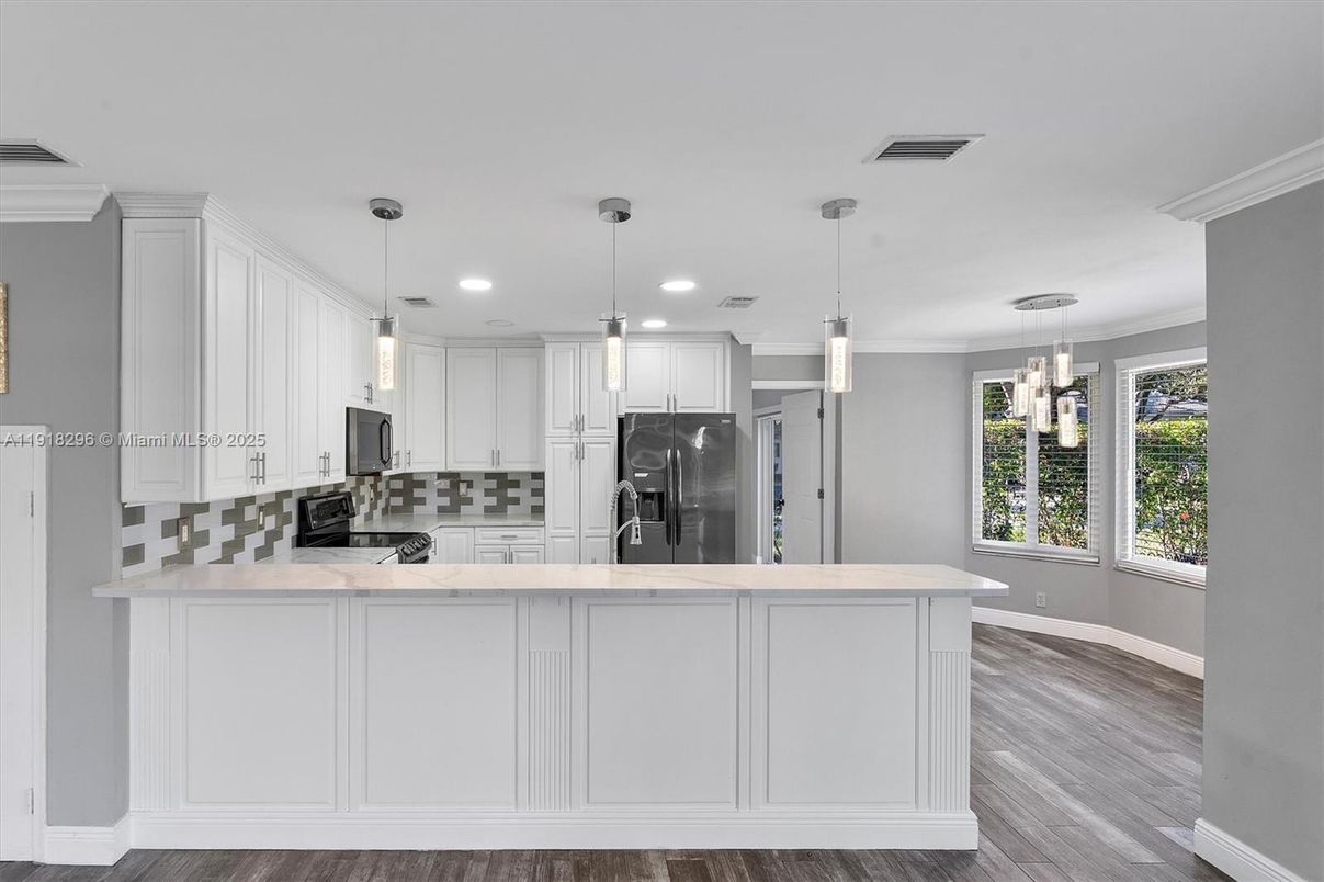Interior, Kitchen, Pendant Lights, Recessed Lighting, Stainless Steel Appliances, Wood Texture Flooring