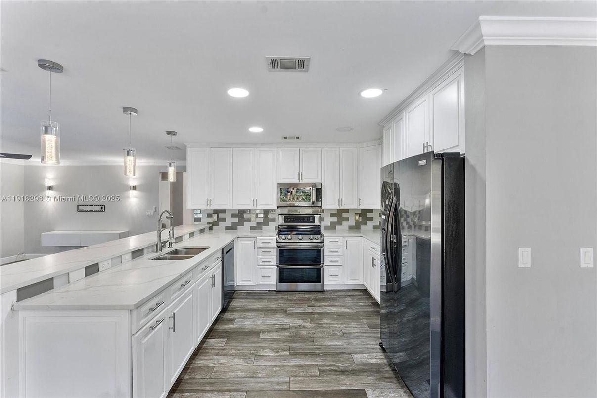Interior, Kitchen, Pendant Lights, Recessed Lighting, Stainless Steel Appliances, Wood Texture Flooring