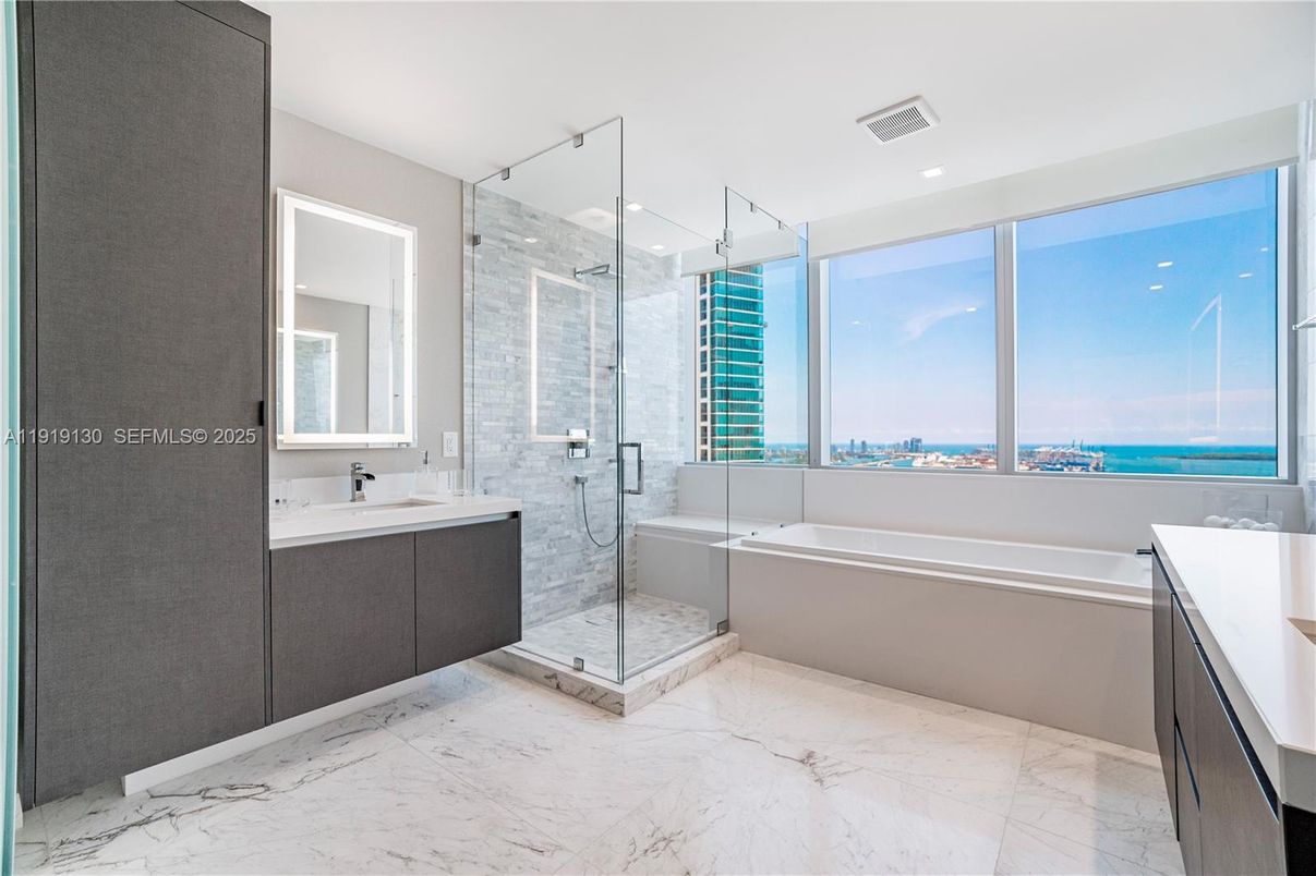 Bathroom, Dual Sink Vanities, Glass Shower, Interior, Marble, Recessed Lighting, Water