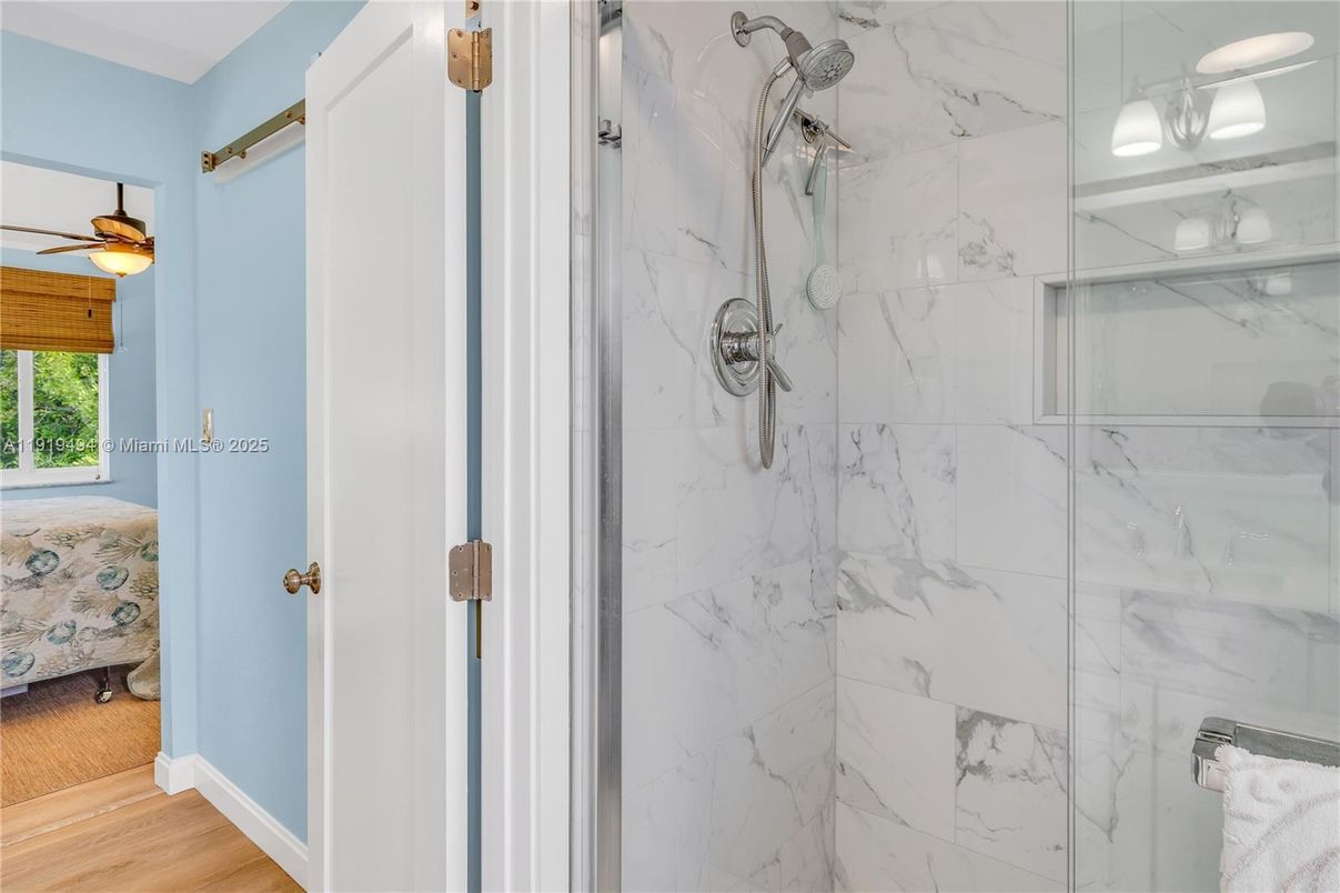 Bathroom, Glass Shower, Interior, Marble Walls, Wood Texture Flooring