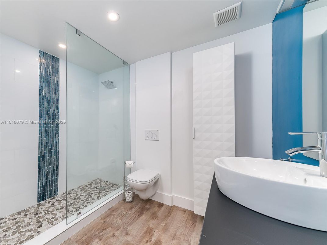 Bathroom, Glass Shower, Interior, Recessed Lighting, Wood Texture Flooring