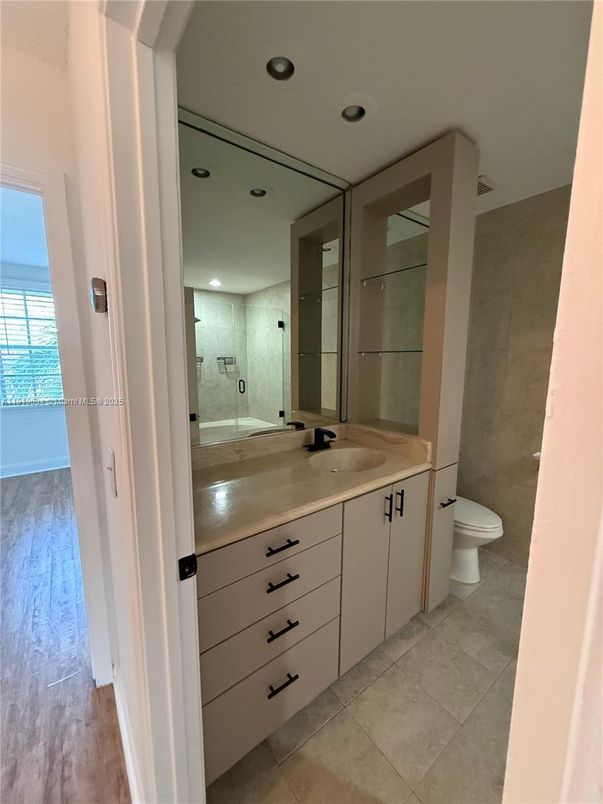 Bathroom, Dual Sink Vanities, Interior, Recessed Lighting, Wood Texture Flooring