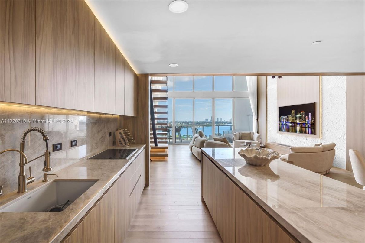 Fireplace, Interior, Kitchen, Recessed Lighting, Water, Wood Texture Flooring