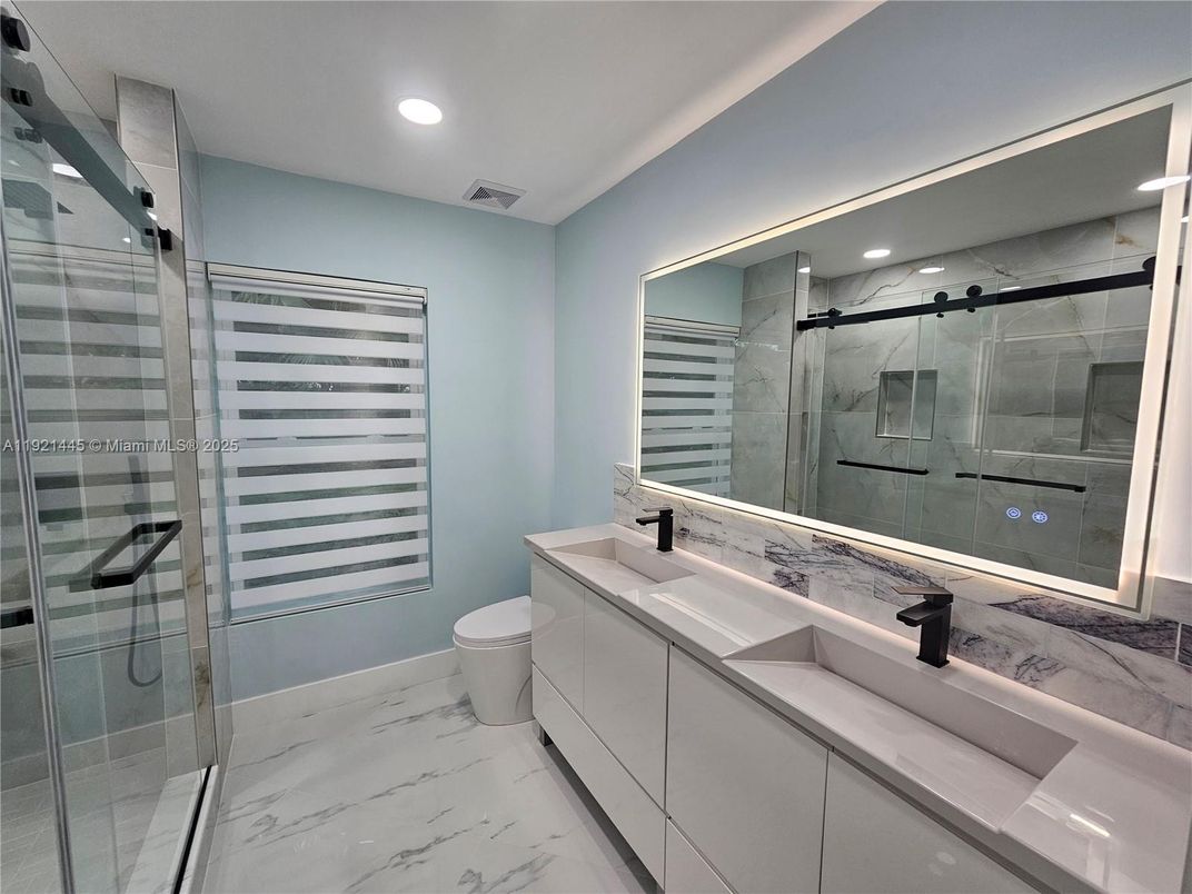 Bathroom, Dual Sink Vanities, Glass Shower, Interior, Marble, Recessed Lighting
