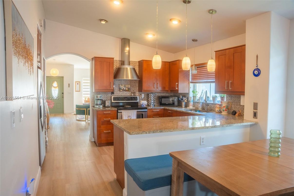 Interior, Kitchen, Pendant Lights, Recessed Lighting, Stainless Steel Appliances, Wood Texture Flooring