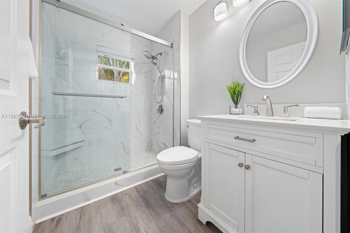 Bathroom, Glass Shower, Interior, Marble Walls, Wood Texture Flooring