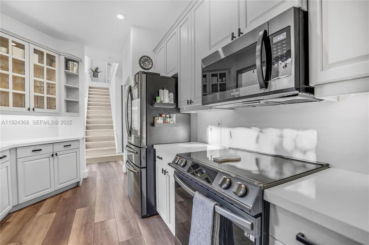 Interior, Kitchen, Recessed Lighting, Stainless Steel Appliances, Wood Texture Flooring