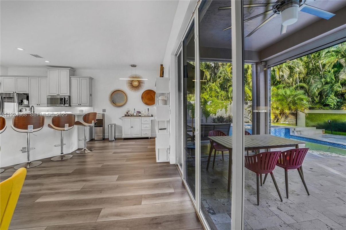 Dining room, Interior, Kitchen, Recessed Lighting, Stainless Steel Appliances, Wood Texture Flooring