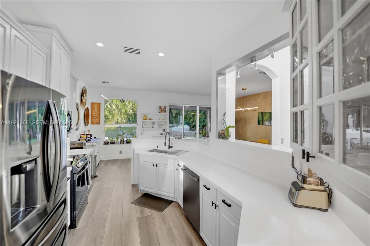 Interior, Kitchen, Pendant Lights, Recessed Lighting, Stainless Steel Appliances, Wood Texture Flooring