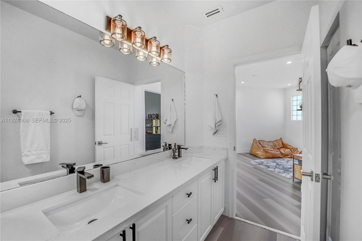 Bathroom, Dual Sink Vanities, Interior, Recessed Lighting, Wood Texture Flooring