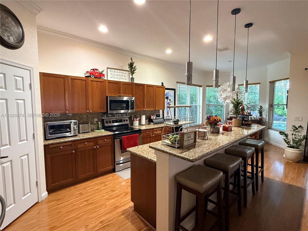 Interior, Kitchen, Pendant Lights, Recessed Lighting, Stainless Steel Appliances, Wood Texture Flooring