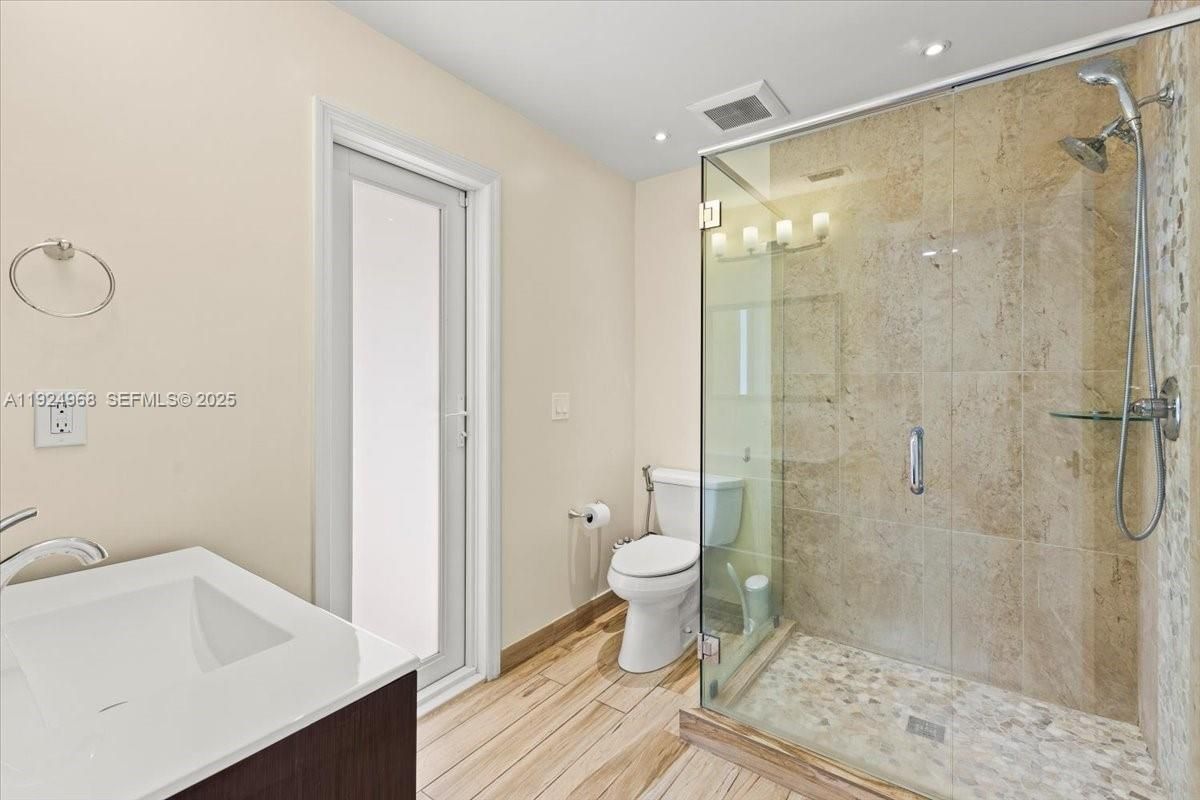 Bathroom, Glass Shower, Interior, Recessed Lighting, Wood Texture Flooring