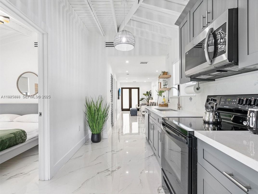 Interior, Kitchen, Marble, Pendant Lights, Recessed Lighting, Stainless Steel Appliances