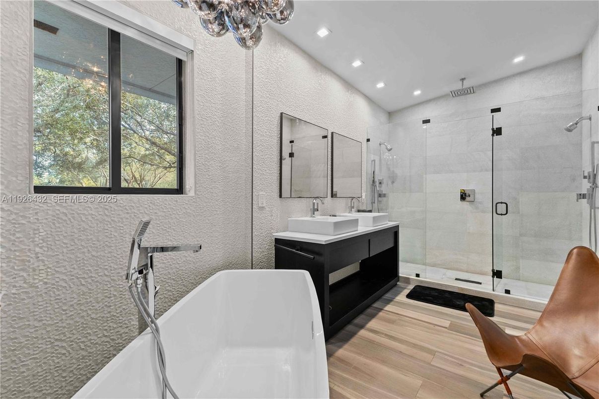Bathroom, Dual Sink Vanities, Free Standing Baths, Glass Shower, Interior, Recessed Lighting, Wood Texture Flooring