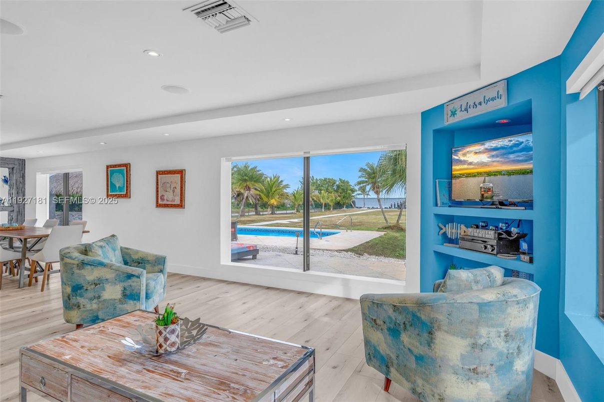 Dining room, Interior, Living room, Recessed Lighting, Water, Wood Texture Flooring