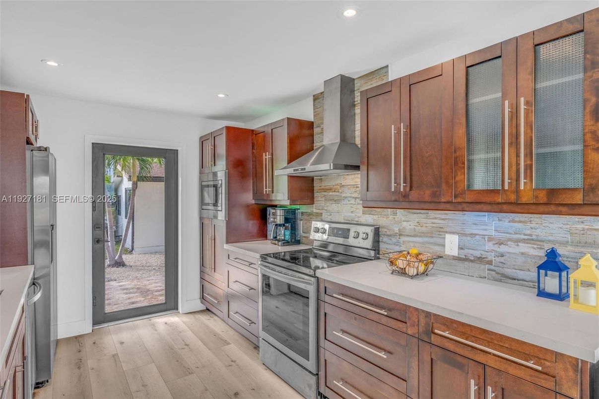 Interior, Kitchen, Recessed Lighting, Stainless Steel Appliances, Wood Texture Flooring