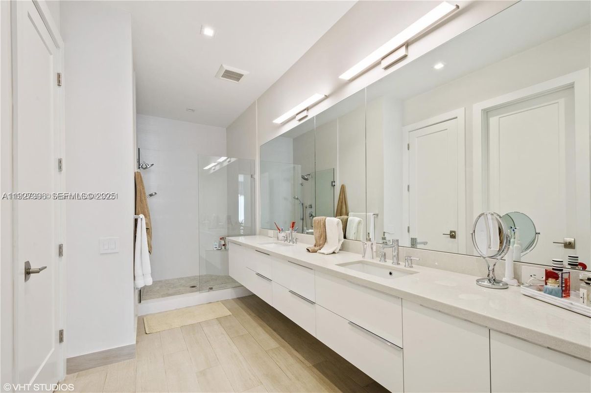 Bathroom, Dual Sink Vanities, Glass Shower, Interior, Recessed Lighting, Wood Texture Flooring
