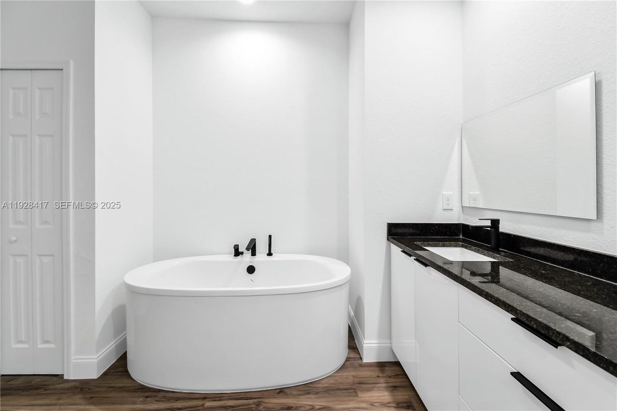 Bathroom, Free Standing Baths, Interior, Recessed Lighting, Wood Texture Flooring