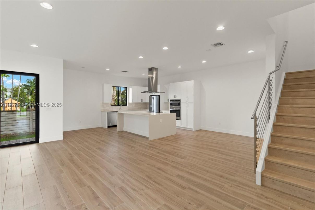 Interior, Kitchen, Recessed Lighting, Stainless Steel Appliances, Wood Texture Flooring