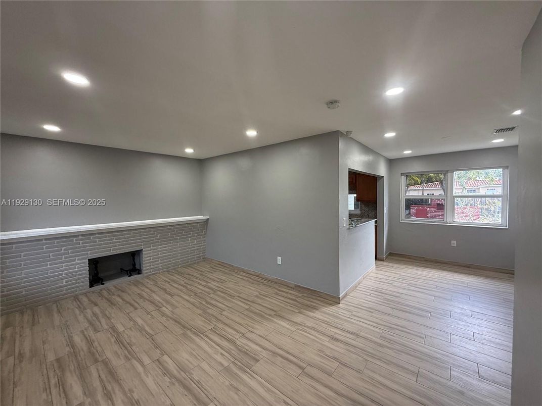 Empty room, Fireplace, Interior, Recessed Lighting, Wood Texture Flooring