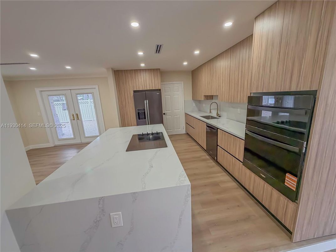 Interior, Kitchen, Recessed Lighting, Stainless Steel Appliances, Wood Texture Flooring
