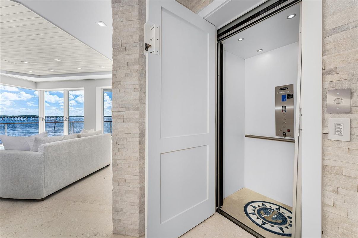 Elevator, Interior, Recessed Lighting, Stone Walls, Water