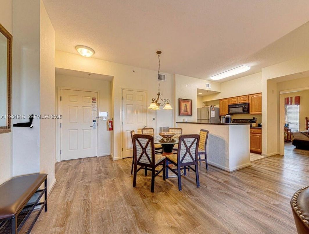 Dining room, Interior, Kitchen, Pendant Lights, Stainless Steel Appliances, Wood Texture Flooring