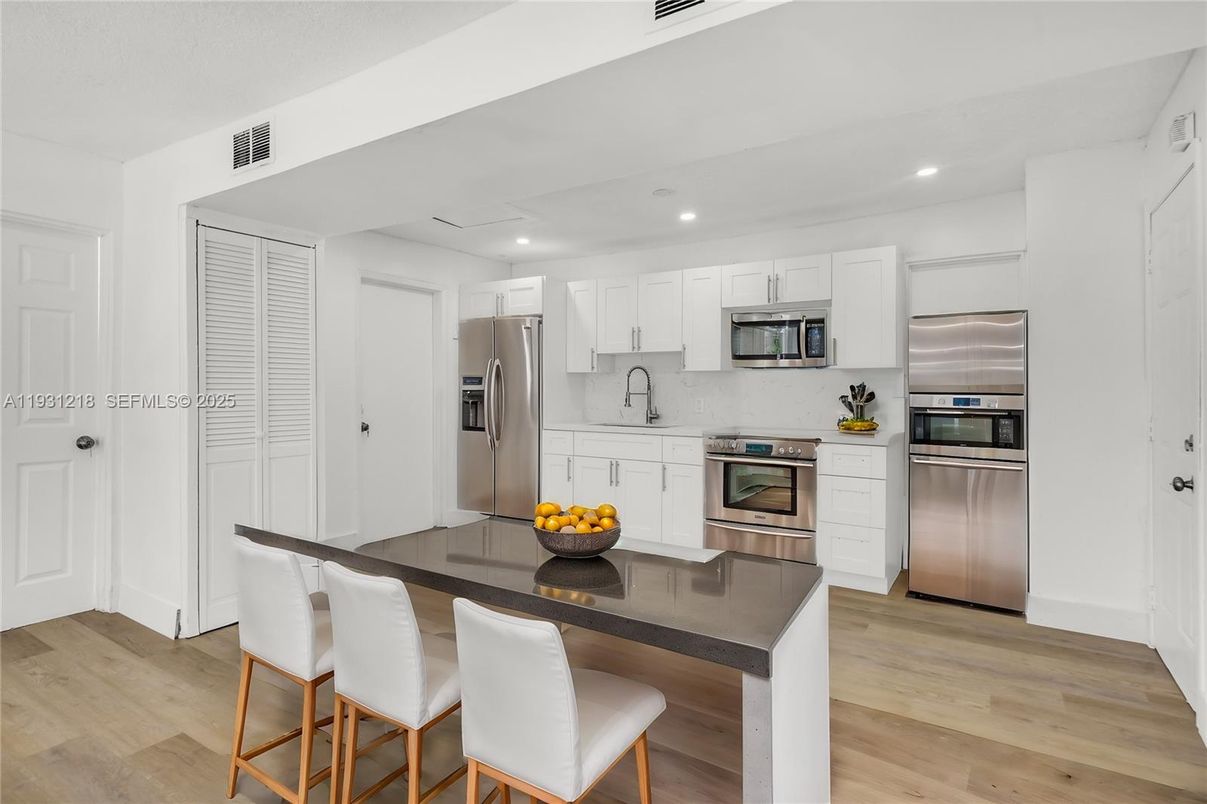 Interior, Kitchen, Recessed Lighting, Stainless Steel Appliances, Wood Texture Flooring